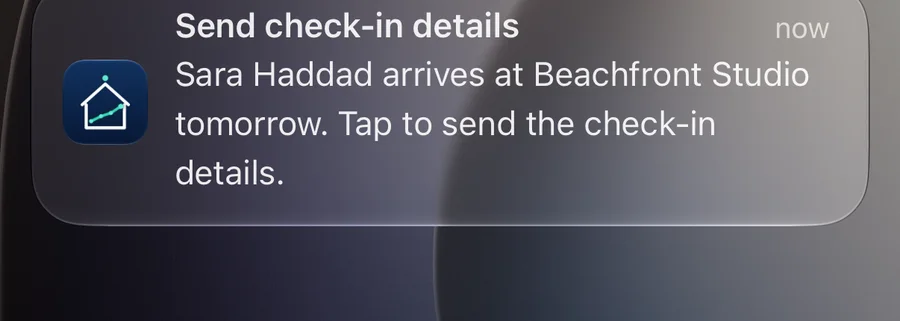 Lock Screen notification: Send check-in details. Sara Haddad arrives at Beachfront Studio tomorrow. Tap to send the check-in details.